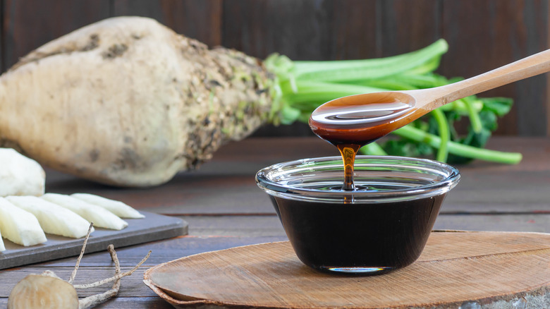 Dark molasses in a bowl