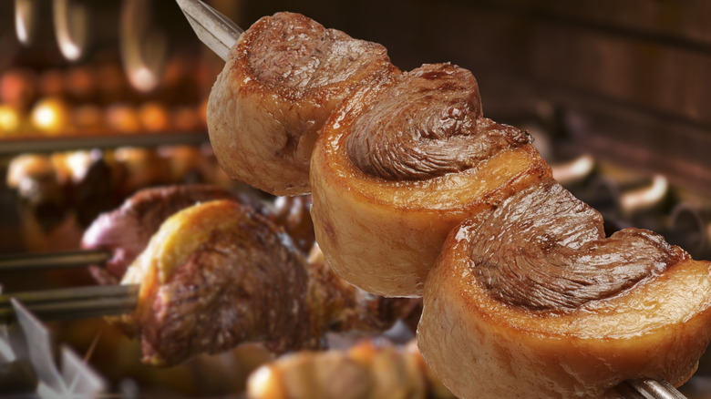 picanha steak on a spit