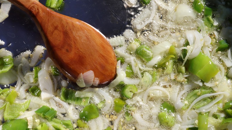 Peppers and onions in saute pan