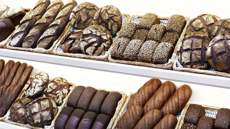 Loaves of bread on bakery shelves