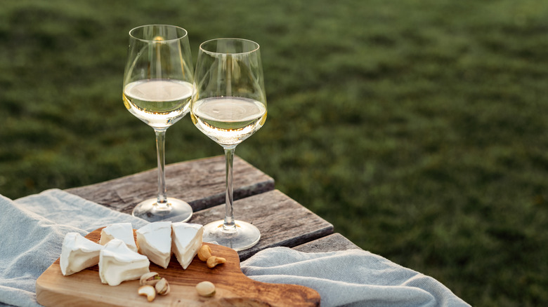 white wine with a cheese board
