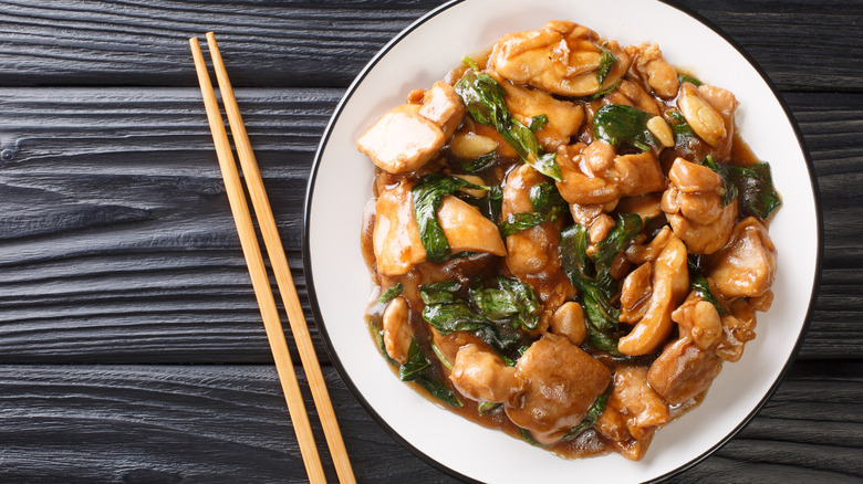 Chinese chicken dish on a white plate