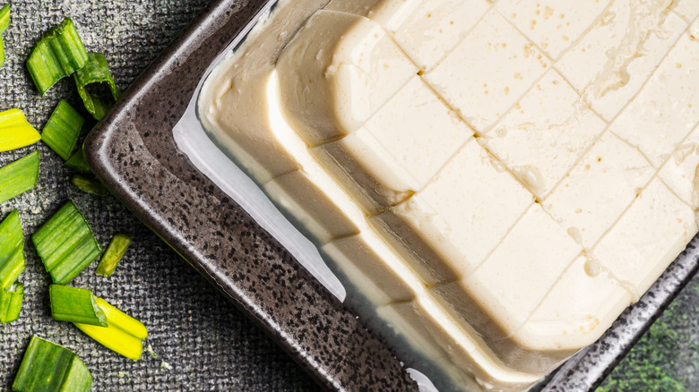 Block of silken tofu cut in cubes