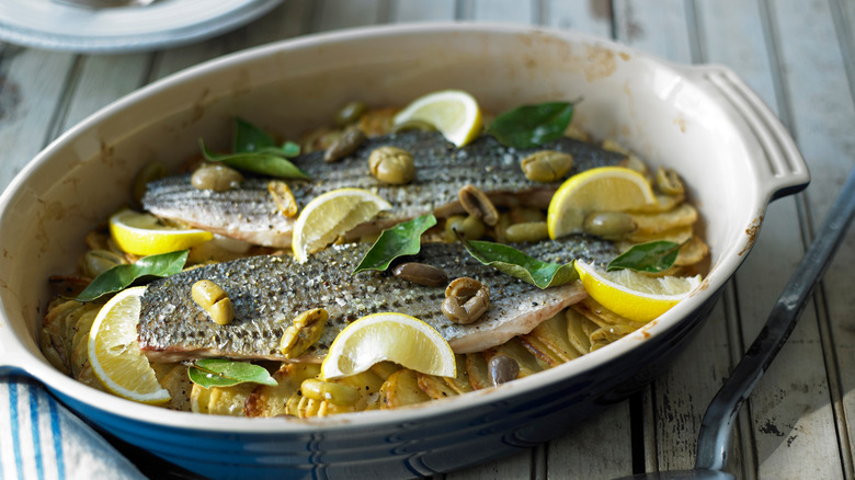 Striped bass with potatoes and olives