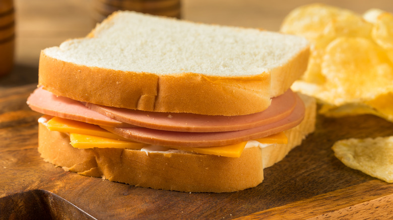 bologna sandwich on cutting board