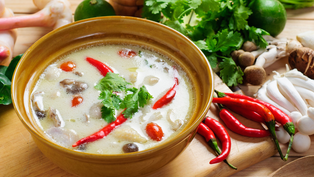 Bowl of tom kha with ingredients