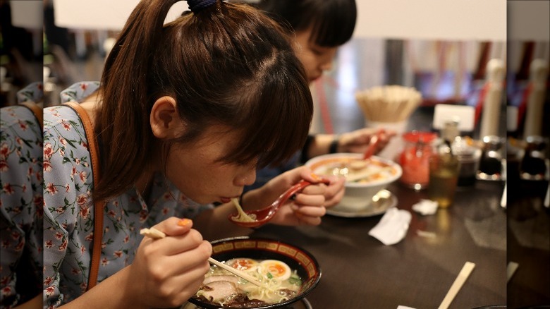 Women eating ramen