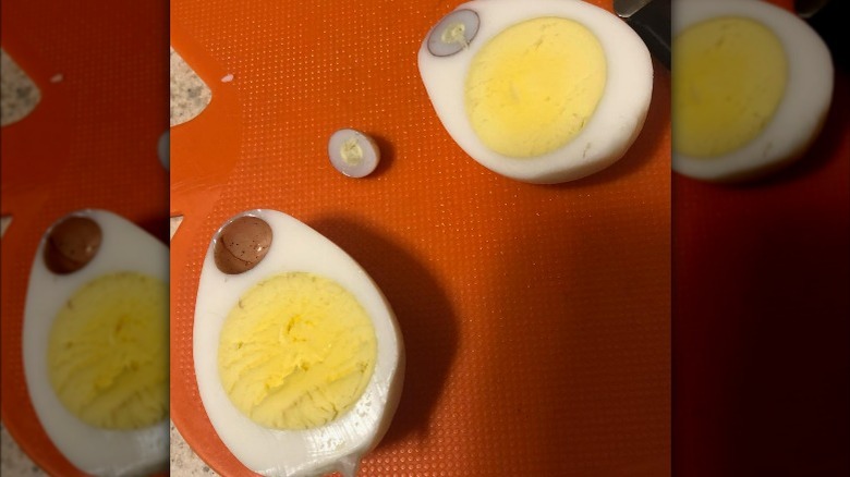 A hard-boiled egg with a smaller egg inside