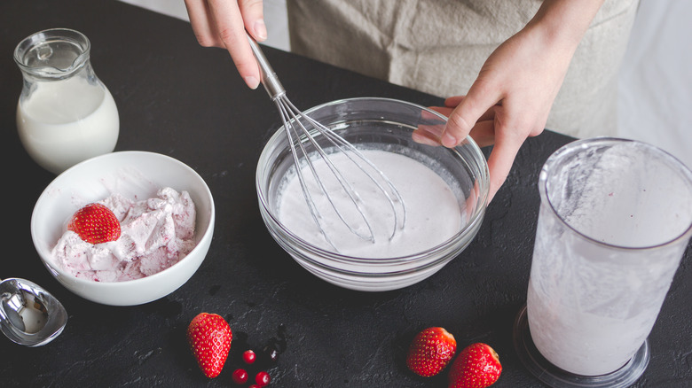 whisking homemade ice cream