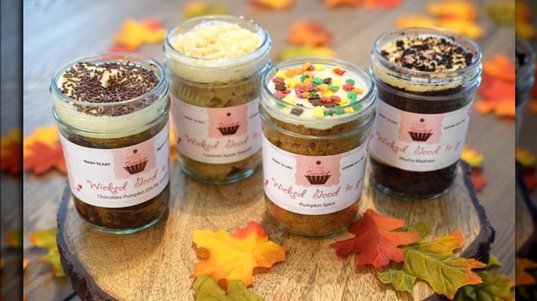 Four desserts in glass jars