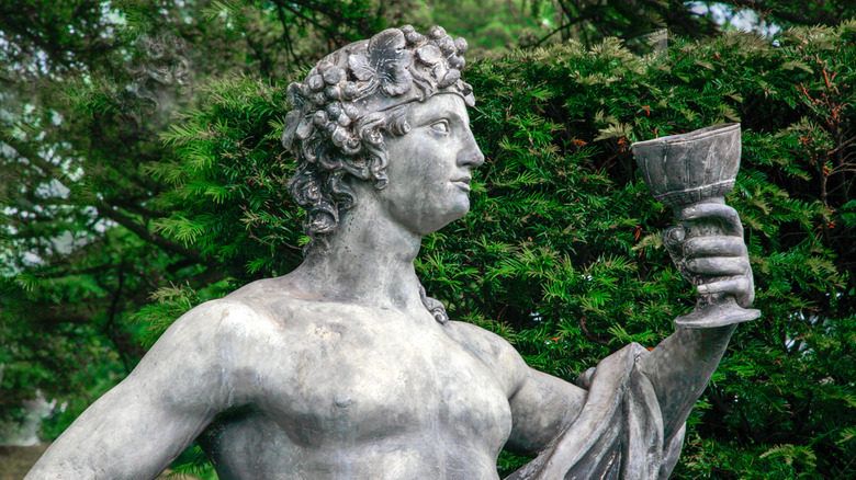 Statue of Dionysus with cup of wine