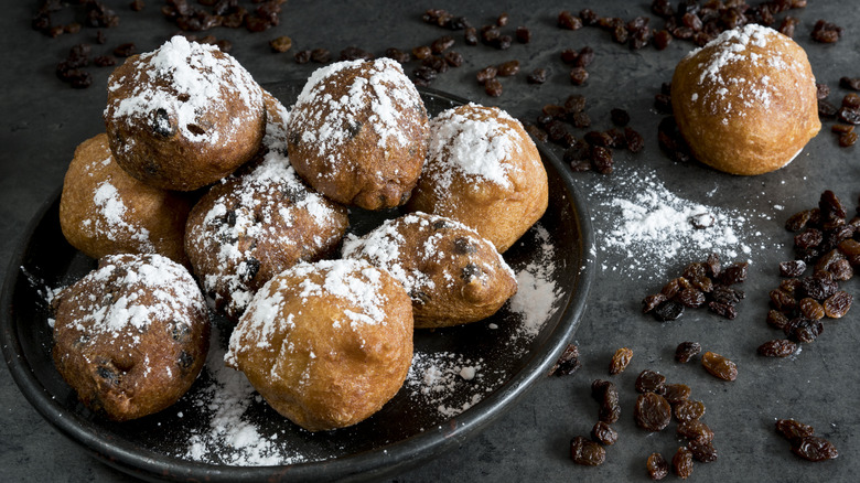 powdered sugar covered Dutch donuts