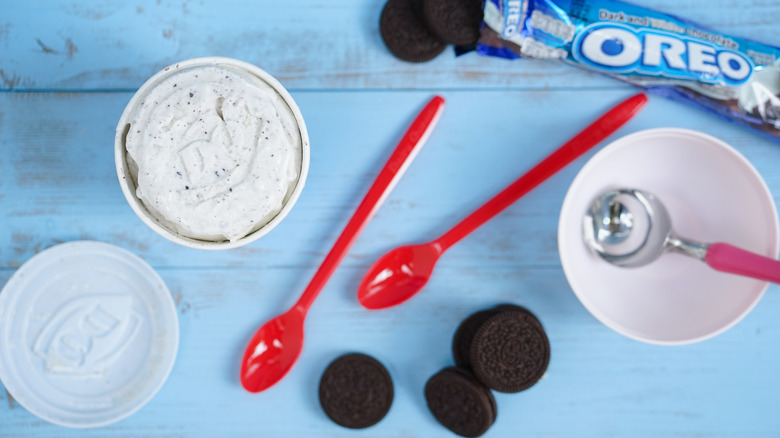 top view of Dairy Queen Oreo Blizzard with extra red spoons and cookies