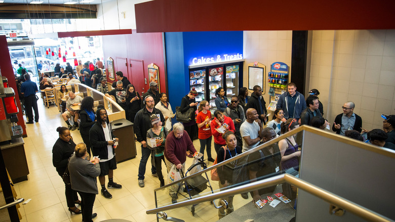 Patrons lined up inside Dairy Queen location