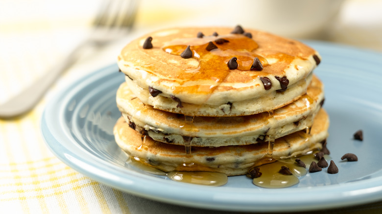 Chocolate chip pancake stack with syrup