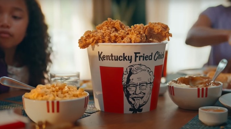 Family eating KFC at table