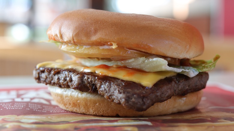 Wendy's cheeseburger on tray