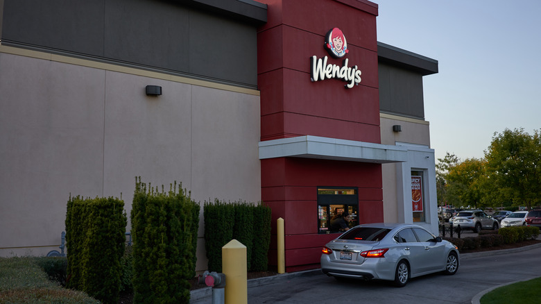 Car waiting at Wendy's drive-thru