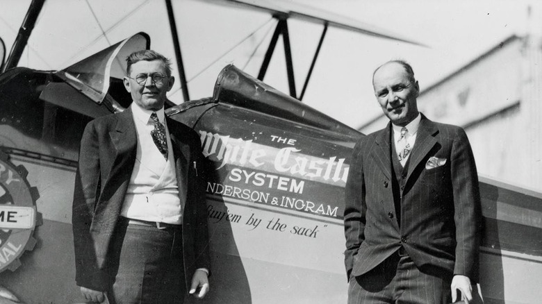 Founders next to airplane 