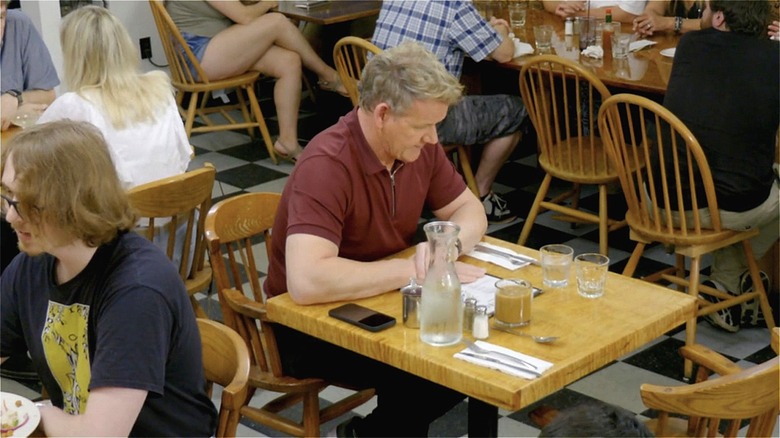 Gordon Ramsay dining with other patrons