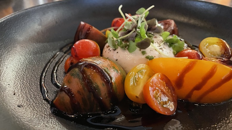 The heirloom tomato and burrata salad at Hell's Kitchen