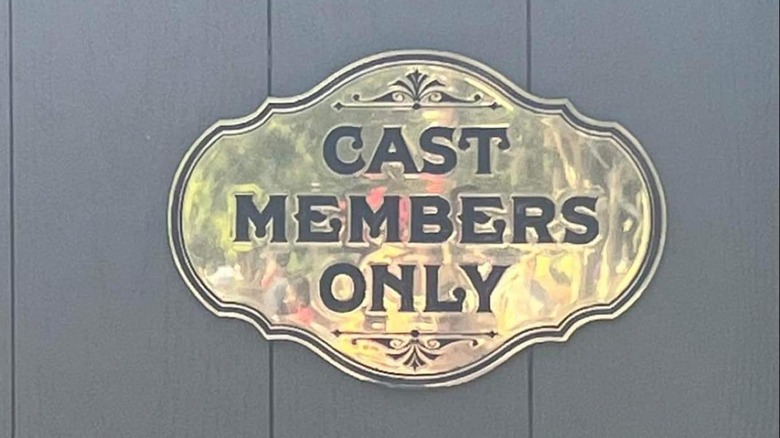 a cast members only sign at the entrance of the disney utilidors