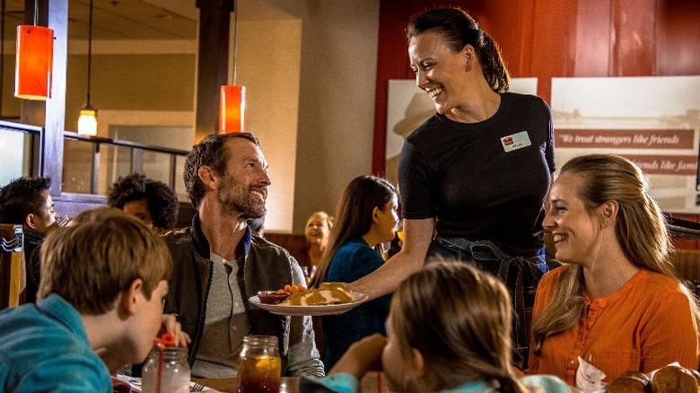 Employee serving customers at Bob Evans