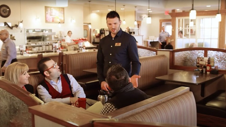 A Bob Evans employee attending to customers