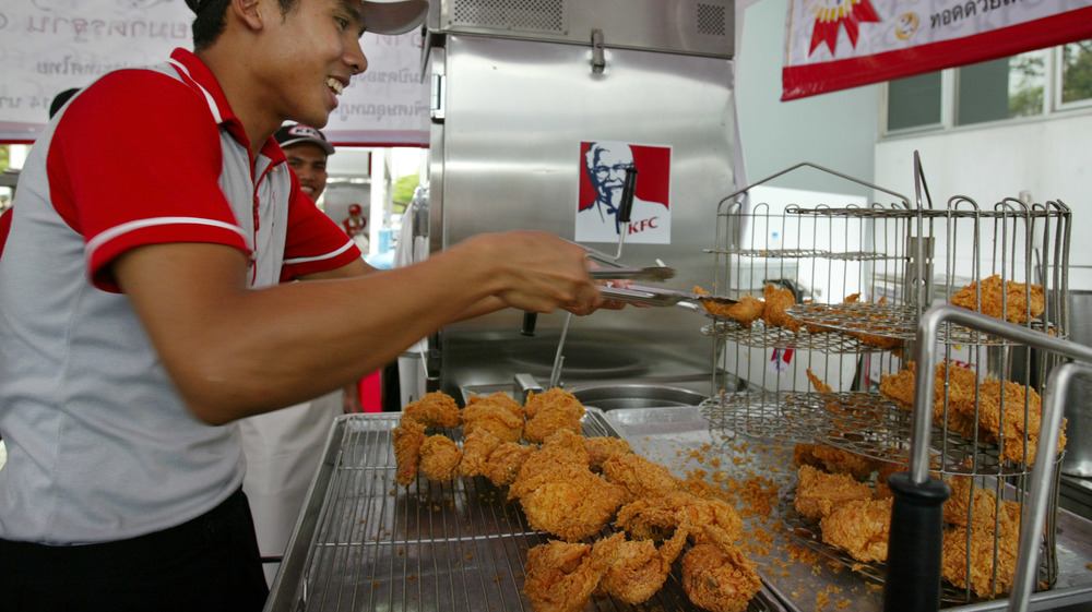 KFC employee cooking chicken