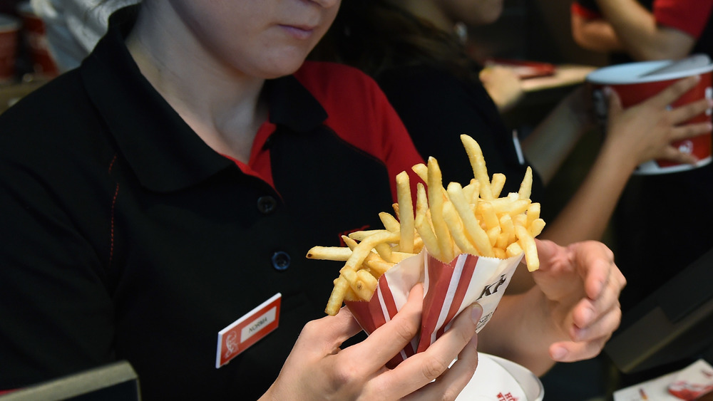 kfc fry cook serving food