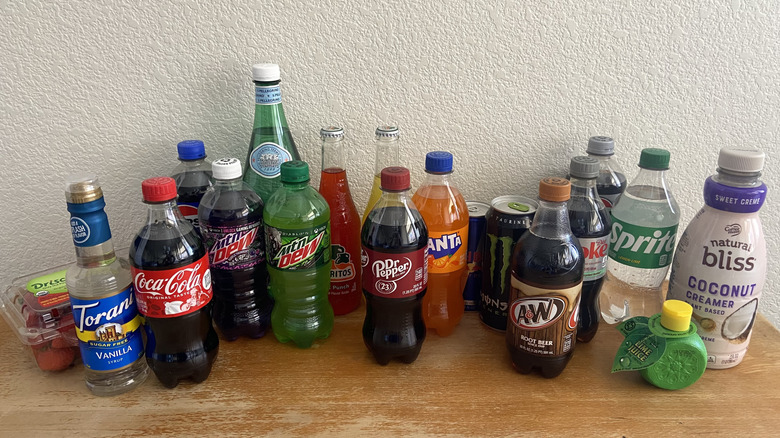 Varied sodas and ingredients lined up