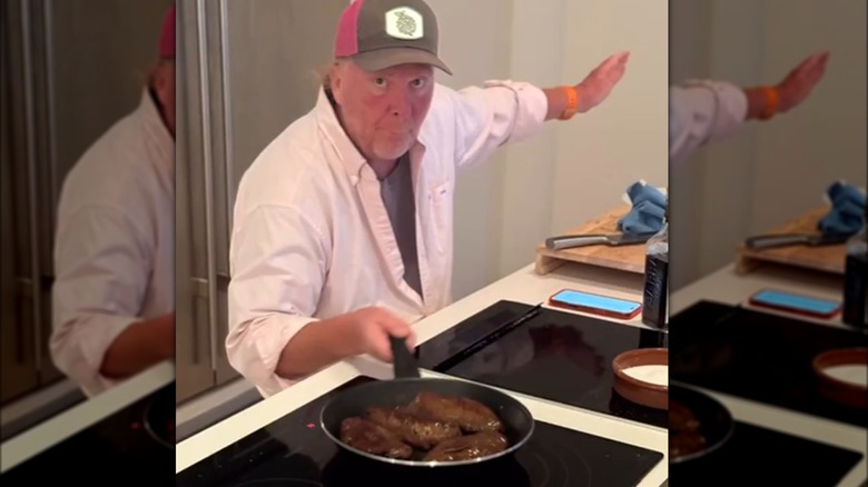 Mario Batali cooking steak