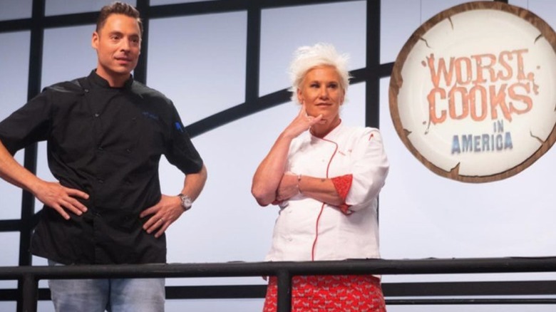 Anne Burrell and Jeff Mauro watching contestants