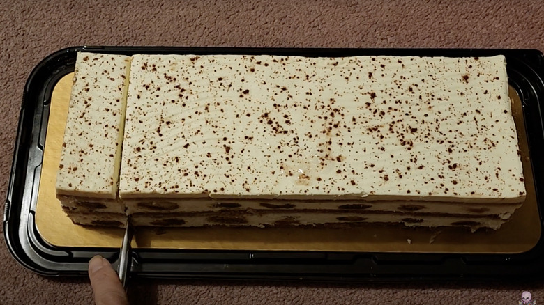 costco tiramisu cake being sliced