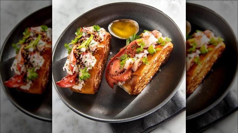 Lobster Rolls on metal plate with butter