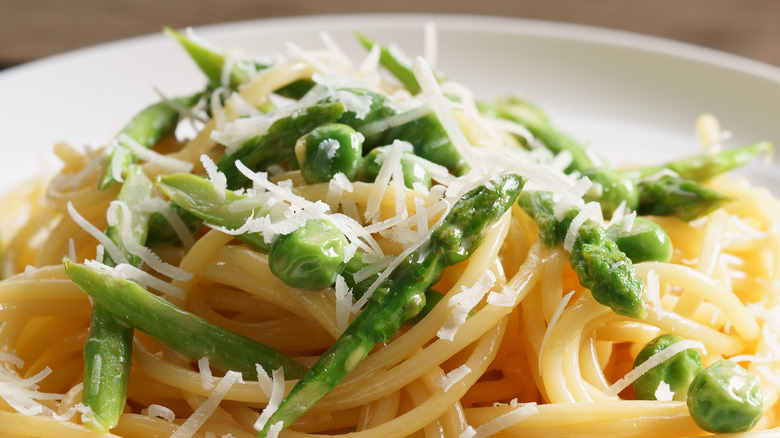 Pasta topped with vegetables