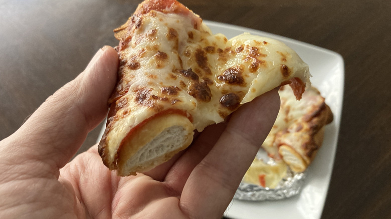 A closeup shows a bite of the pretzel dough.