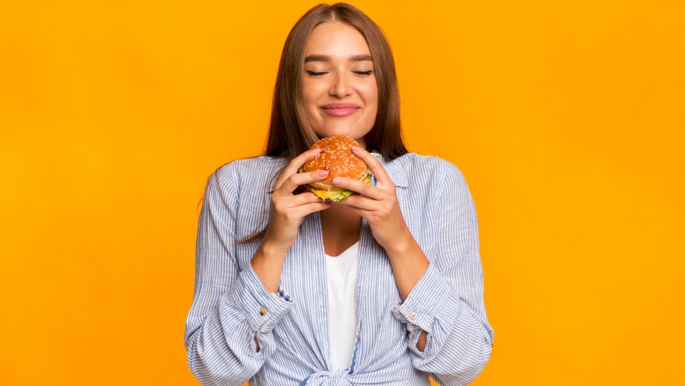 Woman with burger