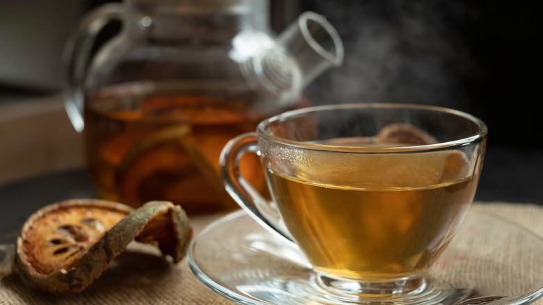 Clear cup with tea