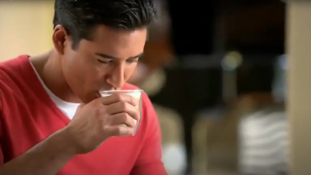 Mario Lopez drinks coffee