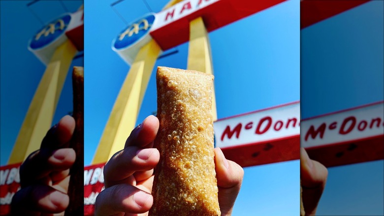 Hand holding fried McDonald's Apple Pie