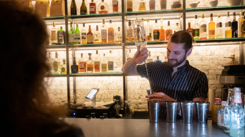 Bartender prepares a drink