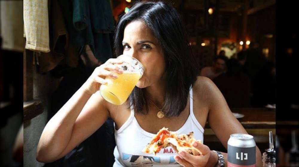 Padma Lakshmi eating pizza