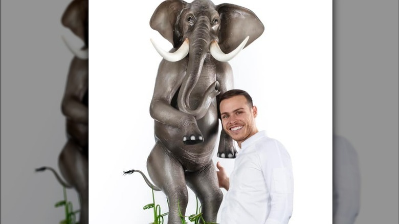 Amaury Guichon with chocolate elephant statue
