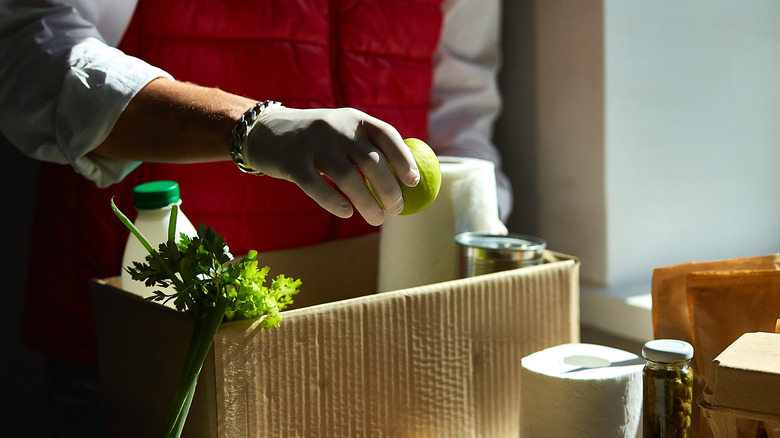 Preparing boxed food donations