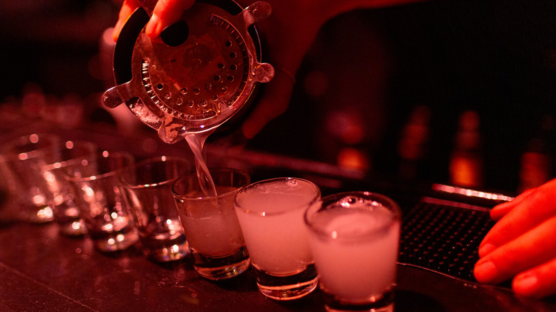 bartender pouring drinks