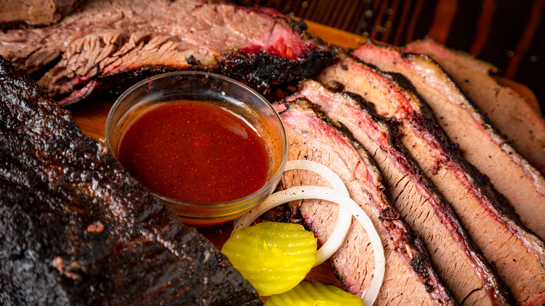 A brisket platter with sauce from Texas Roadhouse