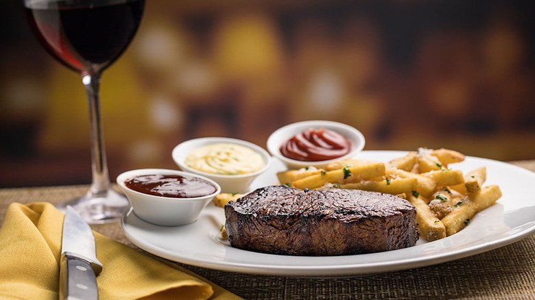 steak and frites white plate