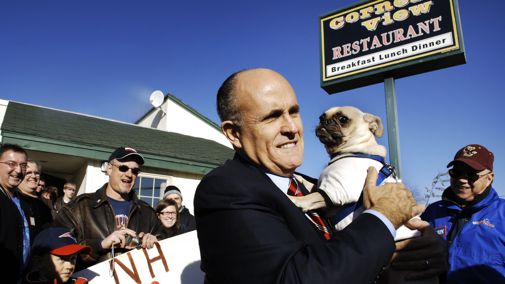 Giuliani at a restaurant with a dog