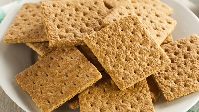 Stack of graham crackers on plate